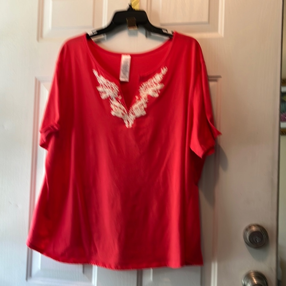 Orange v neck top with cream embroidered